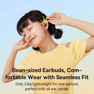 Woman wearing bean-sized earbuds with text highlighting features on a light blue background