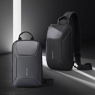 Two gray backpacks, one with a shoulder strap and the other with a handle, on a dark background.