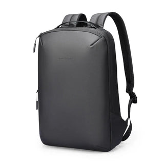 Sleek black travel backpack with padded straps and minimalist design, ideal for tech essentials.