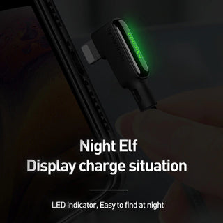Smartphone with a charging cable displaying a green LED indicator, text 'Night Elf Display charge situation' on a dark background.