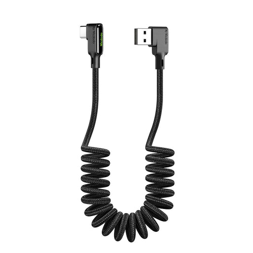 Coiled black USB cable with connectors on a white background