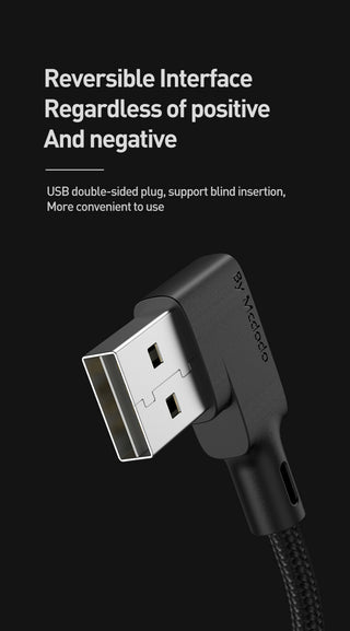USB cable with reversible interface on a black background
