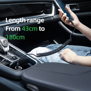 Person using a car charger with a flexible cable inside a vehicle, showing length range from 43cm to 180cm.