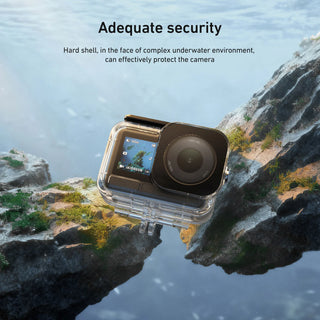 Camera with a hard shell protective case in an underwater setting