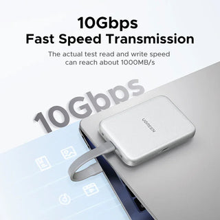 USB drive connected to a laptop with '10Gbps Fast Speed Transmission' text on a light gray background.