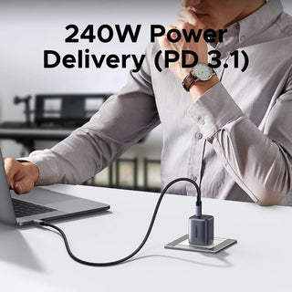 Person using a 240W power delivery device with a laptop, text indicating PD 3.1.