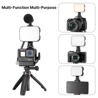 Camera setup with microphone, lights, and tripod on a white background